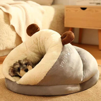 Couchage en forme de pantoufle pour chien et chat